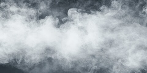 Fototapeta premium Delicate white smoke swirls and flows gracefully against a dark background, adding an element of mystery to the surroundings