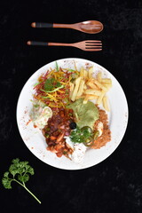 Fried chicken schnitzel cordon bleu with cheese in breadcrumbs is restaurant food. Delicious tender...