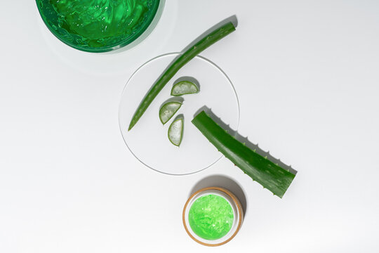 Fresh aloe vera leaves and bright green gel for skincare