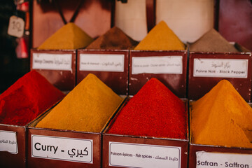 Vibrant spice displays at a market in Marrakech