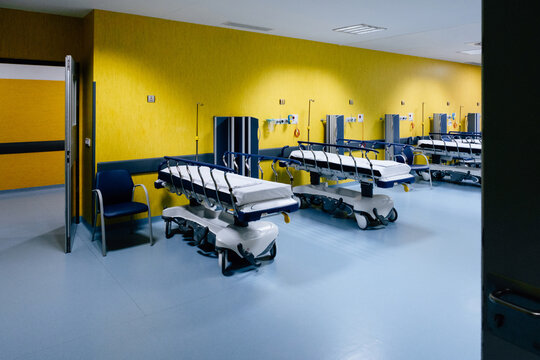 Modern hospital surgery room with multiple beds