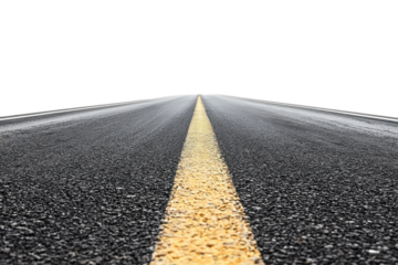 A close-up view of an empty asphalt road with a yellow dividing line stretching into the distance, symbolizing travel and adventure.