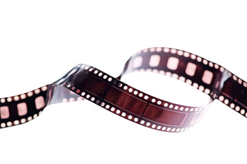 Fototapeta premium Close-up of a vintage film strip with a transparent background. evoking nostalgia and the art of traditional photography and filmmaking.
