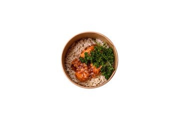 Asian food boiled rice with meat with sweet and sour sauce, spices and herbs