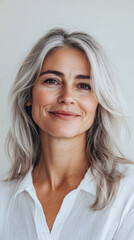 Fototapeta premium Middle aged woman smiling isolated from a copyspace background. Inclusivity conceptual image