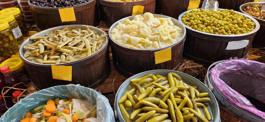 delicatessen products olive varieties, pickled cucumbers and mixed pickles