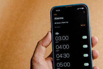 Smartphone Displaying Alarm Clock App, Digital Time Management and Productivity Tool