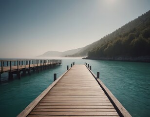 Obraz premium A Beautiful Serene Lake View Featuring a Wooden Pier Set Within a Misty Landscape Scene