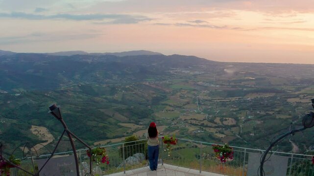 Aerial view of scenic sunset over the tranquil valley and mountains from Terrazza degli innamorati, Trentinara, Italy.
