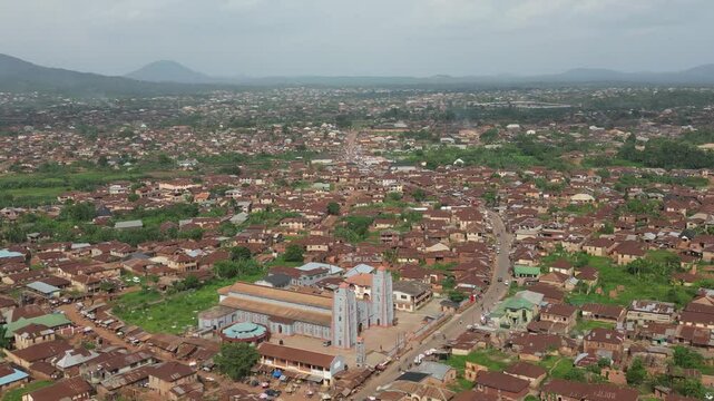 Aerial view of the historic cityscape with a prominent cathedral and surrounding greenery, Ife, Osun, Nigeria.
