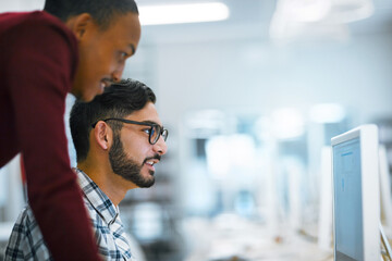 Students, education and computer lab in university with project, assignment and deadline in IT course. People, technology and scholarship in college with desktop, internet and software for research