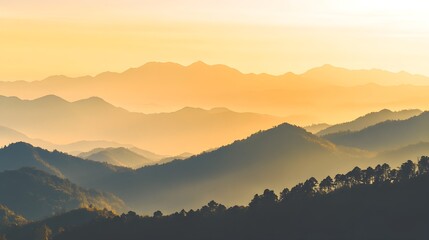 Obraz premium A breathtaking view of a majestic mountain range bathed in golden sunlight, with a soft gradient sky in the background