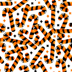 Halloween seamless pattern with candies and black and orange stripes on white background, perfect vector design for halloween treats, decorations, fabric, wrapping paper, party supplies, festive