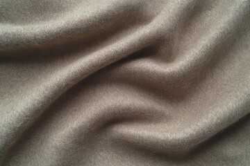 Obraz premium Close-Up Macro Shot of Fine Beige Wool Fabric with Visible Texture and Subtle Stitching