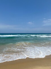 Sea foam on the beach