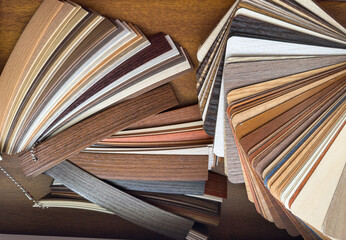 Fototapeta premium close up a wooden or plastic laminate samples for renovation