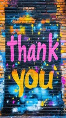 A vibrant mural featuring the words thank you in bright colors, showcasing street art that conveys...