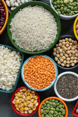 several pots with raw grains for preparing healthy food