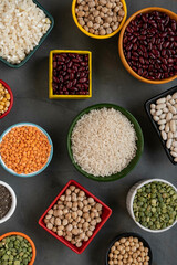 several pots with raw grains for preparing healthy food