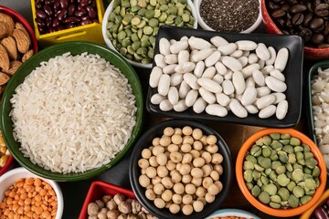 several pots with raw grains for preparing healthy food
