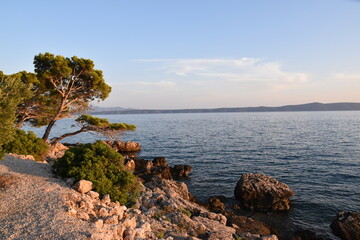 Chrwacja - wybrzeże w blasku zachodzącego słońca © GregStu