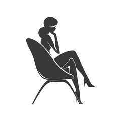 Silhouette of a Woman Sitting in a Chair