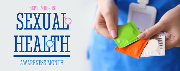 Female doctor with condoms in clinic, closeup