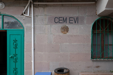 External view of the Cem evi building. A cemevi or cem evi  "a house of gathering" in Turkish)  is a place of fundamental importance for Turkey's Alevi-Bektashiyyah tariqa populations, Ankara, Turkey.