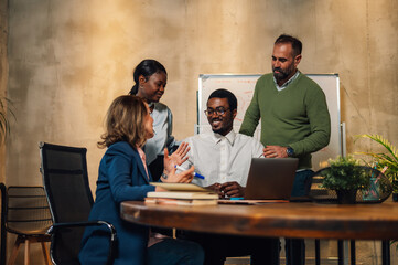 Multiracial business people talking and having a brainstorming in an office
