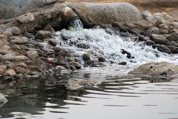 river splashing against rocks