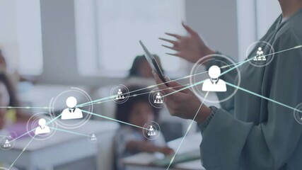 Animation of network of connections with people icons over diverse schoolchildren and female teacher - Powered by Adobe