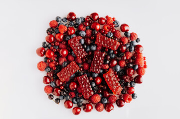 Natural berry marmalade on fresh fruit and berries, perfect for advertising healthy sweet treats