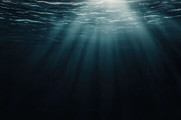Beneath surface, dark abyss reveals tranquil underwater rays