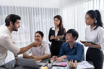 Data analysts team of office worker collaborate on business intelligence BI dashboard to analyze financial, trend, and marketing data. BI software utilization drive business success. Prudent