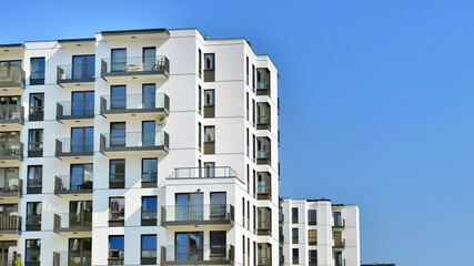 Fototapeta premium Modern architecture of urban residential apartment building. Apartment building exterior, residential house facade.