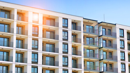 Obraz premium Modern architecture of urban residential apartment building. Apartment building exterior, residential house facade.