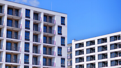 Fototapeta premium Modern architecture of urban residential apartment building. Apartment building exterior, residential house facade.