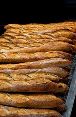 Pile of freshly baked baguettes