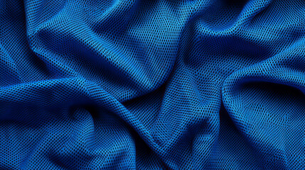 "Texture of blue sports clothing fabric, featuring a football shirt or jersey design."