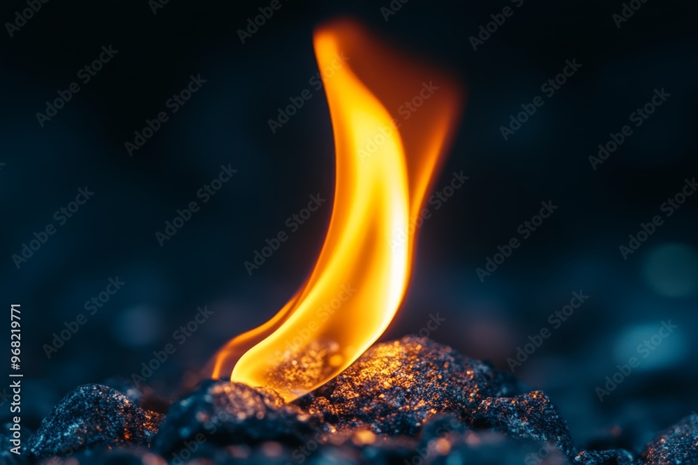 Poster a captivating close-up of a bright flame on a dark surface, highlighting the intense heat and glow o