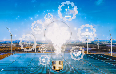 Green energy innovation light bulb with future industry of power generation icon graphic interface....