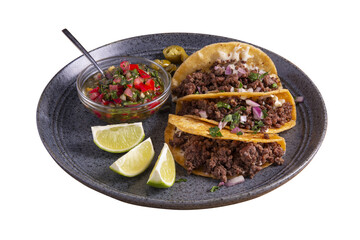Delicious tacos filled with beef served on a plate. Isolated on white background. Full depth of field.