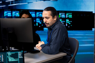 Computer scientists in data center updating systems, protecting servers from damaging software...