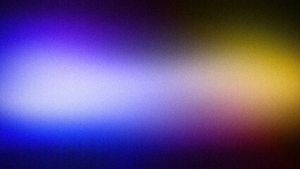 Obraz premium A 4K gradient backdrop with a rich blend of violet, blue, yellow, and dark tones. The grainy texture adds depth, creating a vibrant and contemporary aesthetic for digital use