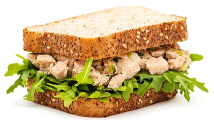 A sandwich with meat and greens on a white background