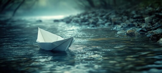 Obraz premium A white, pristine paper boat floating in a murky, polluted river