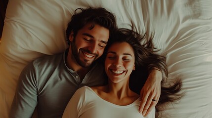 Couple relaxing together on a cozy bed in a softly lit room, enjoying a moment of intimacy and happiness during the evening