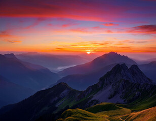 Fototapeta premium A breathtaking view of a mountain range at sunset, with the sky painted in shades of orange,