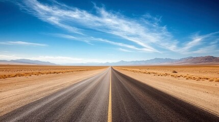 Fototapeta premium A desert highway stretching endlessly into the distance, with nothing but sand and sky in sight.