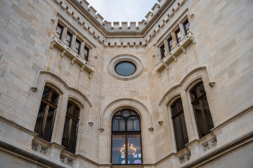 Details on facade of Wonderful Miramare Castle built on the coastline of the Gulf of Trieste (Italy) in 1860 for Austrian Archduke Ferdinand Maximilian. Trieste, Italy 04.01.2024
